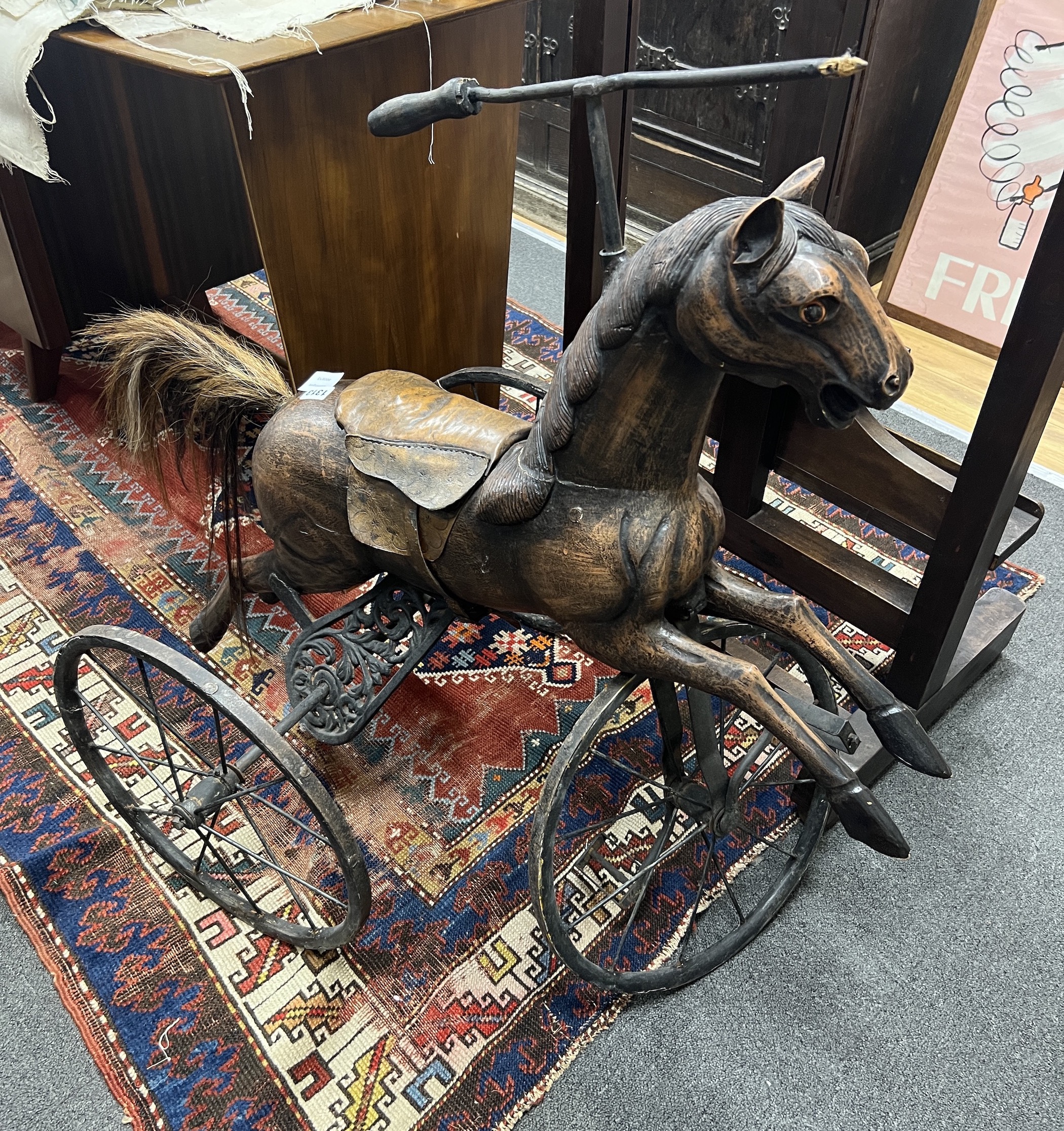 A Victorian style horse tricycle, height 84cm